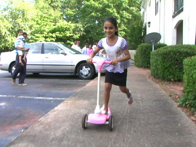 Bhutanese girl on a scooter