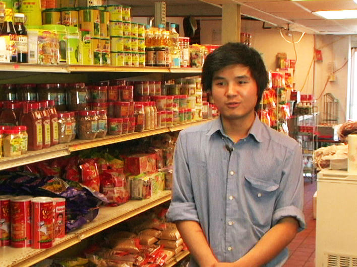 Young man talking about the store his family owns