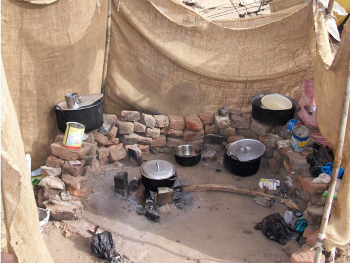 Cooking facilities in camp where Darfuris live in Chad