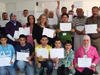 CO class attendees with certificates of completion